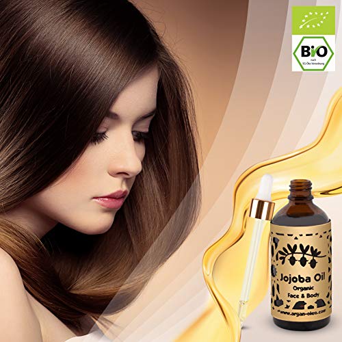 R&M - Aceite de jojoba prensado en frío para cara, cuerpo, cabello y más - 100% orgánico, comercio justo - Una piel más bella, una cara más limpia y un cabello fuerte - Botella Fair Trade - 100 ml