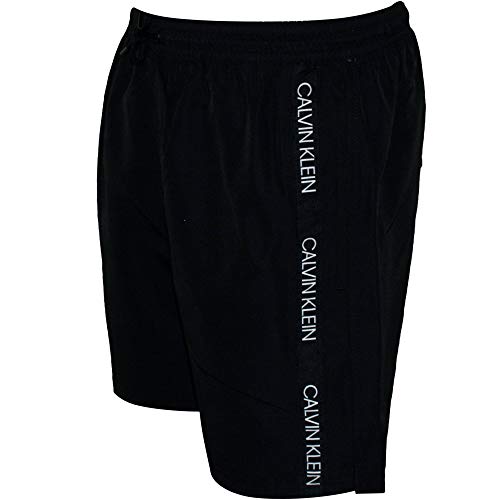 Calvin Klein Logo Cinta Chicos De Natación Shorts, Negro Edad 12-14