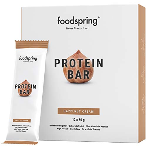 foodspring Barritas de Proteína, Sabor Avellana, Pack de 12 x 60g, Sin azúcar añadido, Baja en carbohidratos, Perfectas para después de entrenar