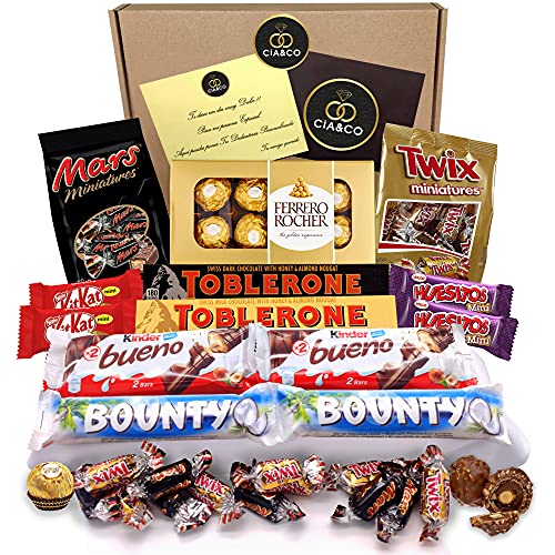 Lote envuelto para Regalo con +20 Bombones y Chocolates Ferrero Rocher, Toblerone, Kinder Bueno, Bounty Coco, Mars, Twix y Ricas Barritas Kit Kat y Huesitos. Regalo Original para personas Exigentes