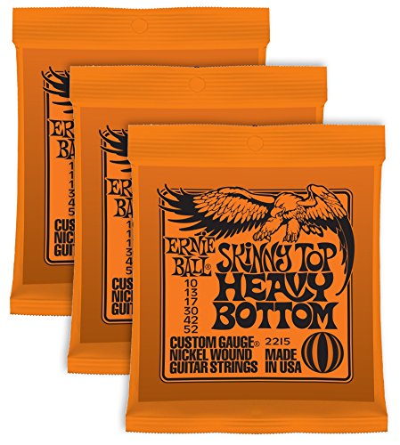 Cuerdas para guitarra Ernie Ball Skinny Top Heavy set enrollado de níquel,010 a,052; paquete de 3 sets.